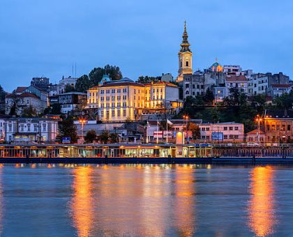 Panorama of Belgrade at night with river Sava
